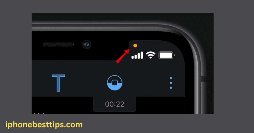 orange dot at the top of the iPhone